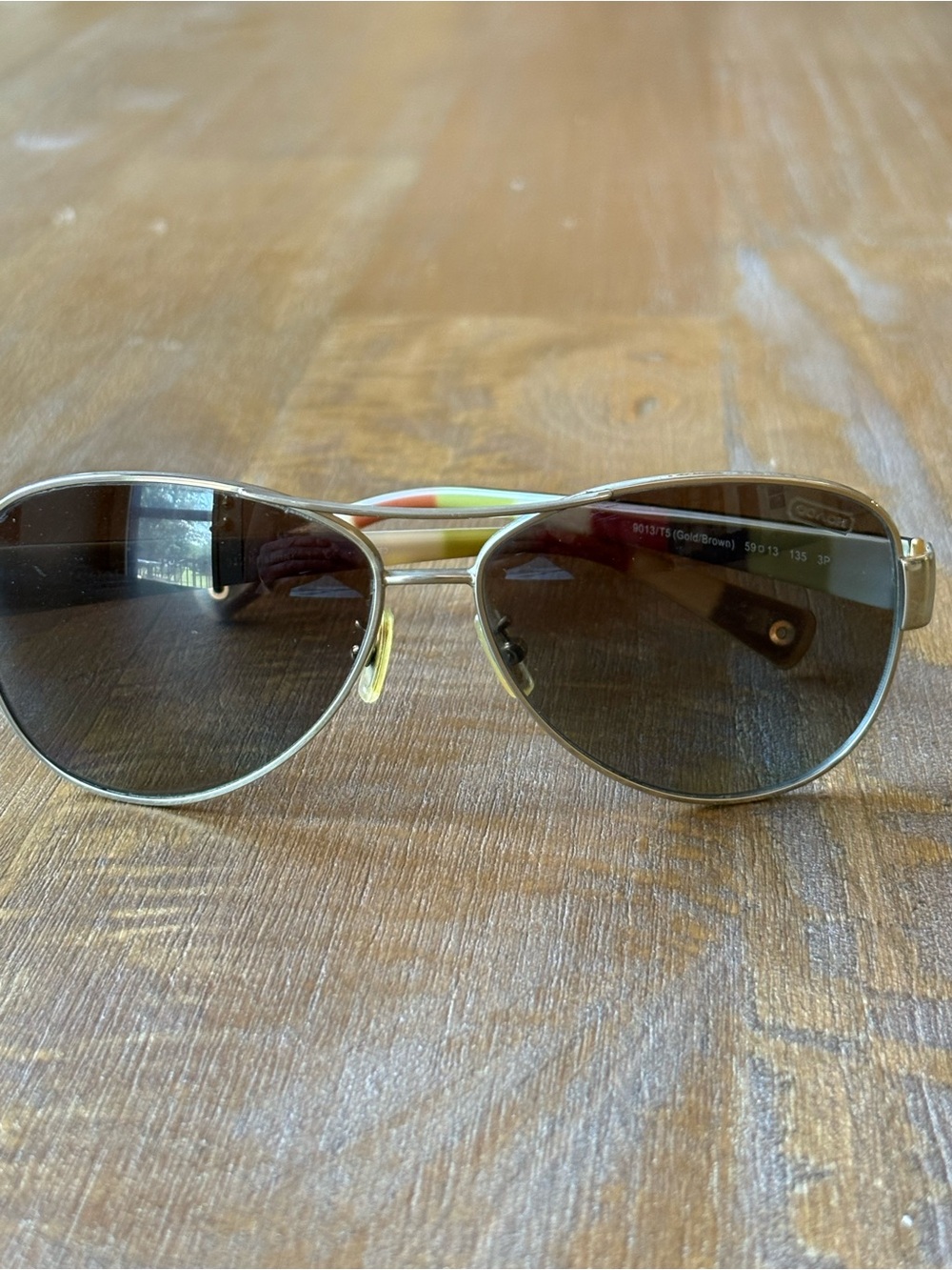 Coach Aviator Sunglasses with Brown Lenses and Gold Frame